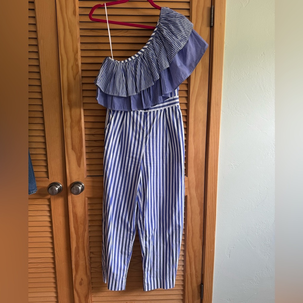 One shoulder large ruffle blue and white striped romper.